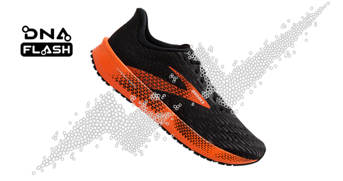 A black and orange running shoe